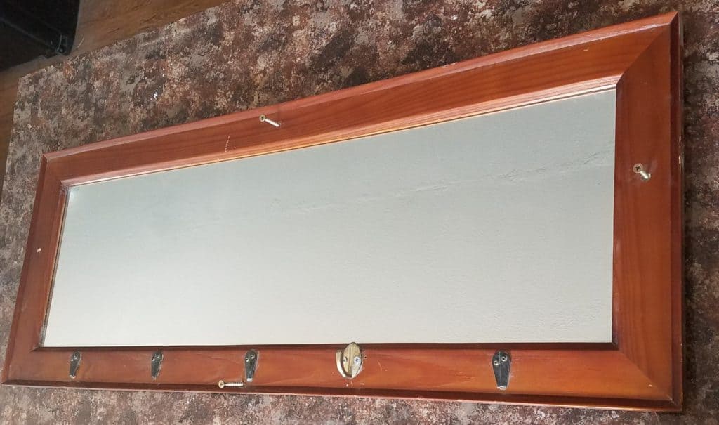 How to reuse an old mirror to create a new, modern piece of home decor. Create your own style with this tutorial. Works great for farmhouse fixer upper style decorations.