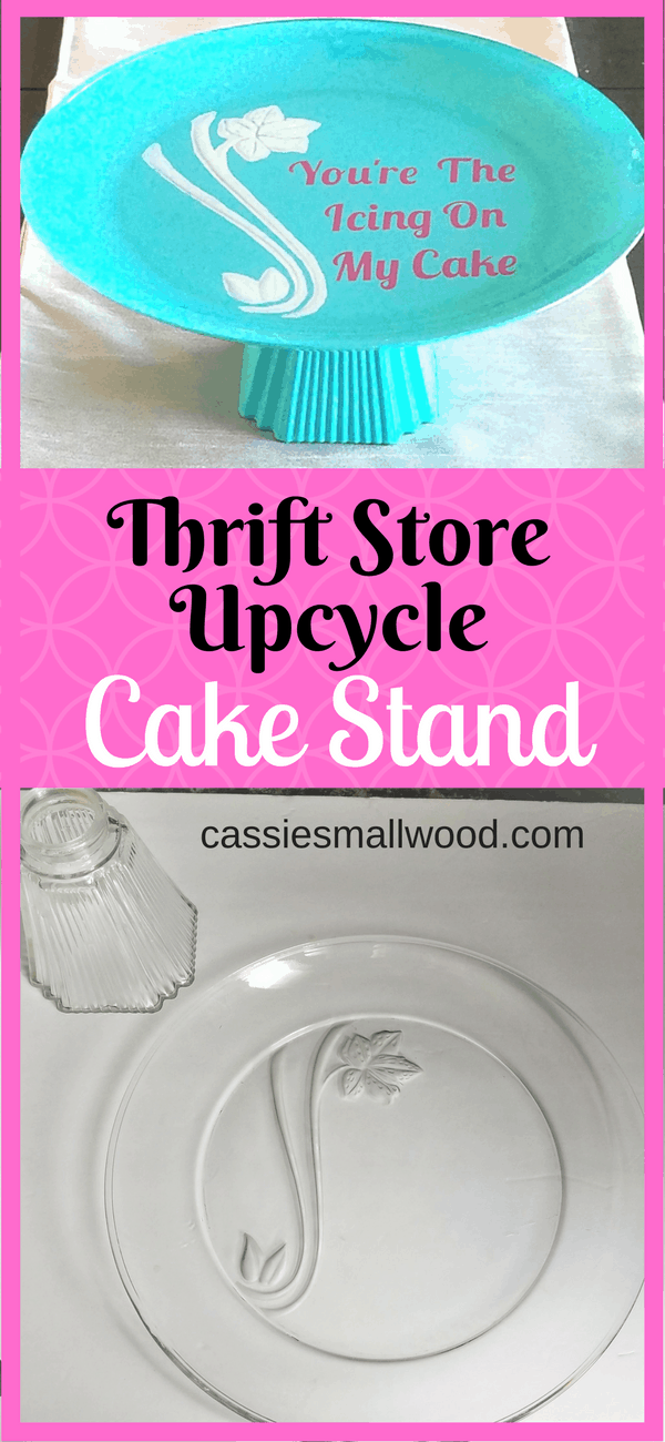 A glass platter and ceiling fan light cover a beautiful cake