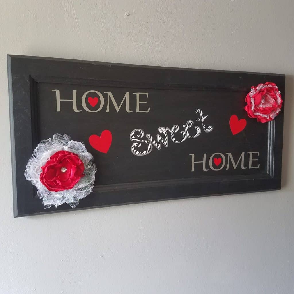 This DIY home sweet home sign with melted fabric flowers is a simple project for making a DIY wood sign. It can be made with or without a Cricut. The burned flowers are so pretty!