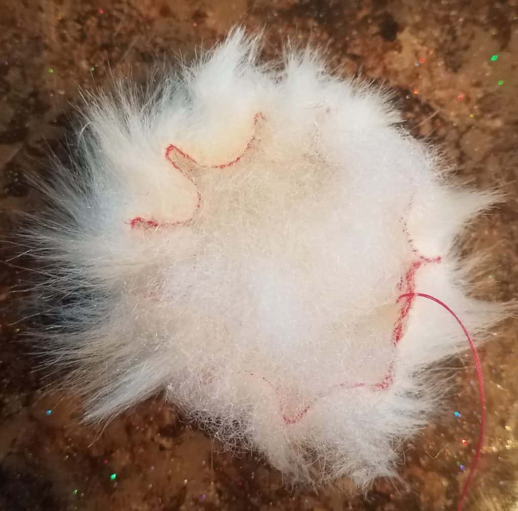faux fur pom pom with poly fil inside