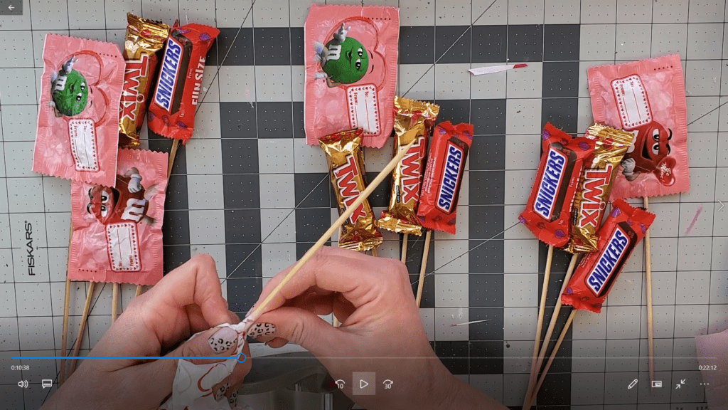 tape the tissue paper to the skewer