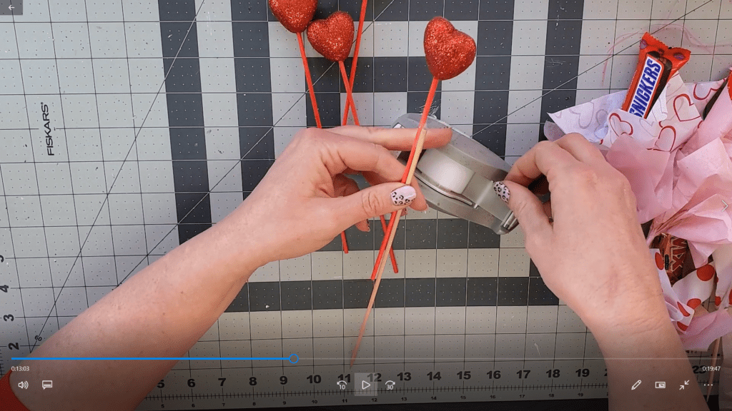 attach heart picks to skewers