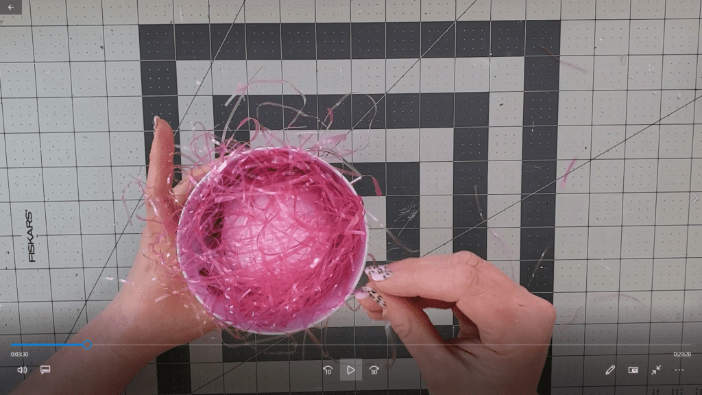 making a candy bouquet - cover styrofoam with paper shred or easter grass