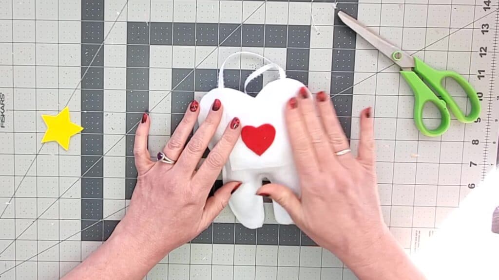 attach heart to pocket of tooth fairy pillow