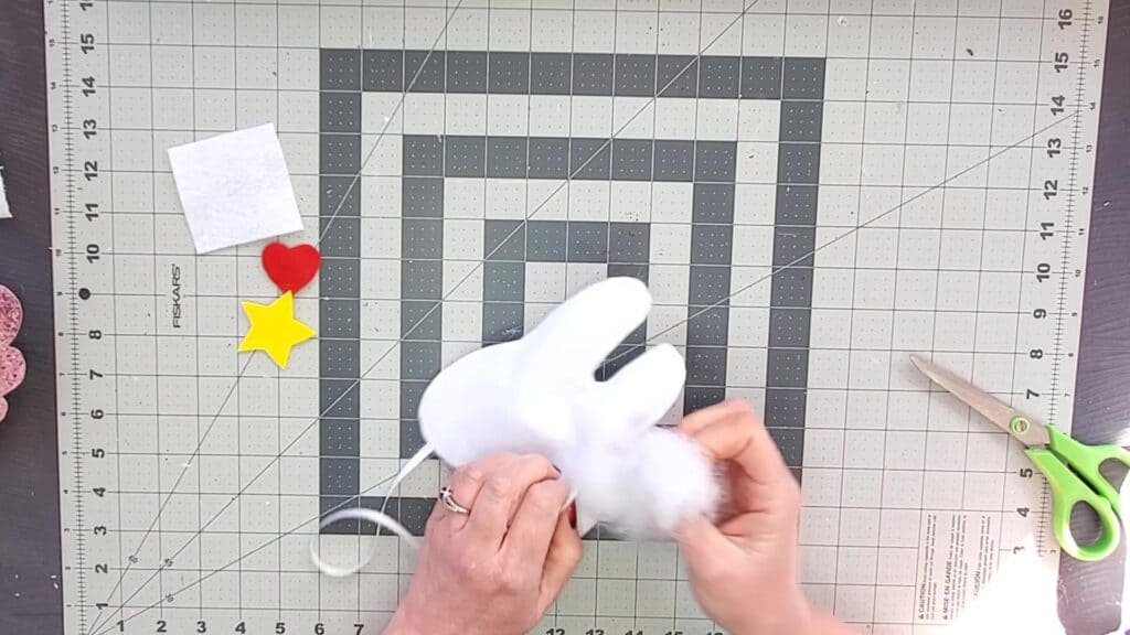 stuffing the tooth fairy pillow