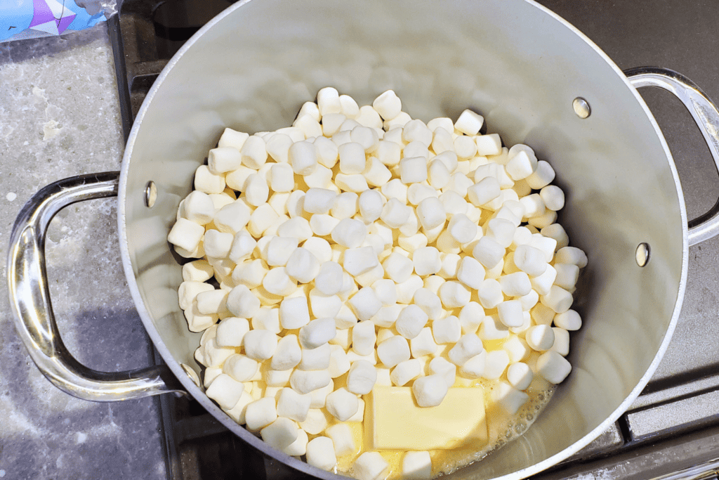 making raw meat rice krispies treats for halloween Marshmallows and butter in a large stock pot